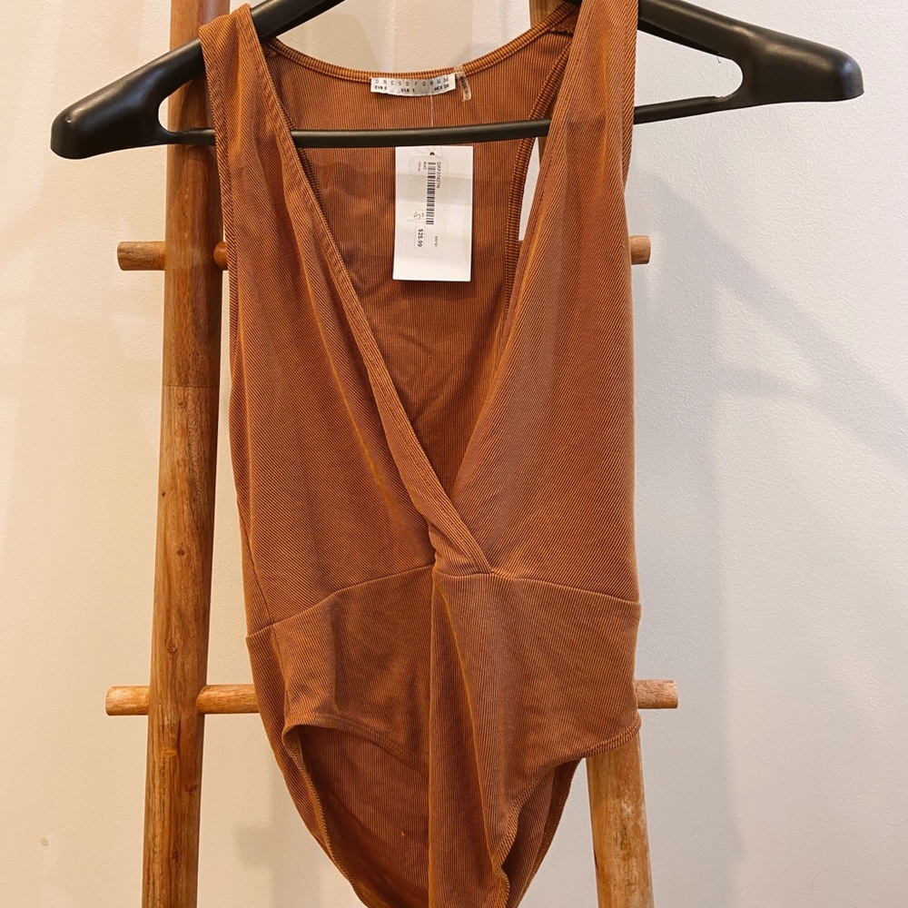 No rest for Bridget tan bodysuit